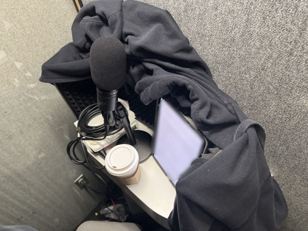 Travel acoustic foam set up inside a Delta Sky Club phone booth for a voiceover recording