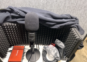 A voiceover set up in a Delta Sky Club phone booth
