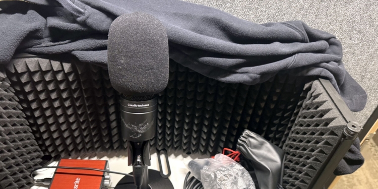 A voiceover set up in a Delta Sky Club phone booth