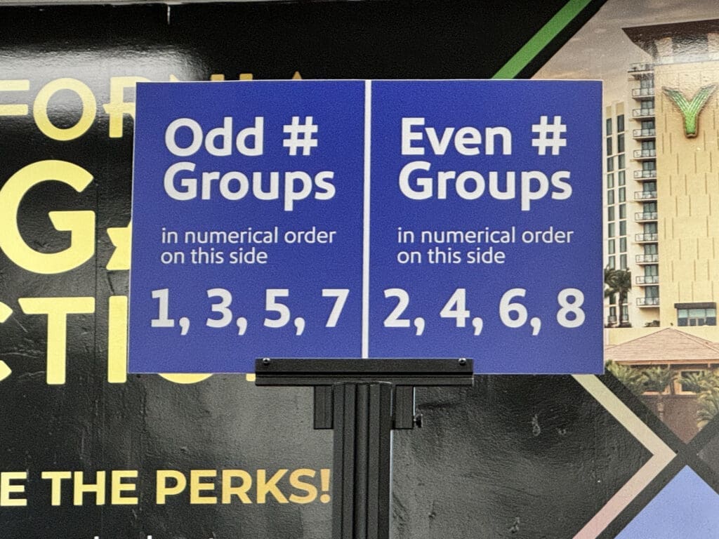 Southwest boarding sign directing odd-numbered groups (1, 3, 5, 7) and even-numbered groups (2, 4, 6, 8) to separate sides at Hollywood-Burbank Airport (BUR)