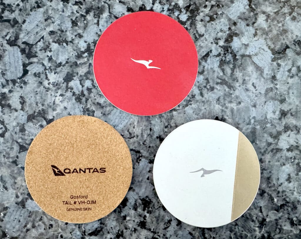 A full set of four coasters cut from the fuselage skin of retired Qantas Boeing 747s