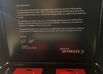 The image shows a congratulatory letter and two red bag tags from Delta Air Lines for achieving "Million Miler" status. The letter, signed by Ed Bastian, CEO of Delta, expresses gratitude for the recipient's loyalty and outlines the benefits of the status, including complimentary Medallion® Status. The bag tags are branded with "Million Miler" and "Delta SkyMiles."